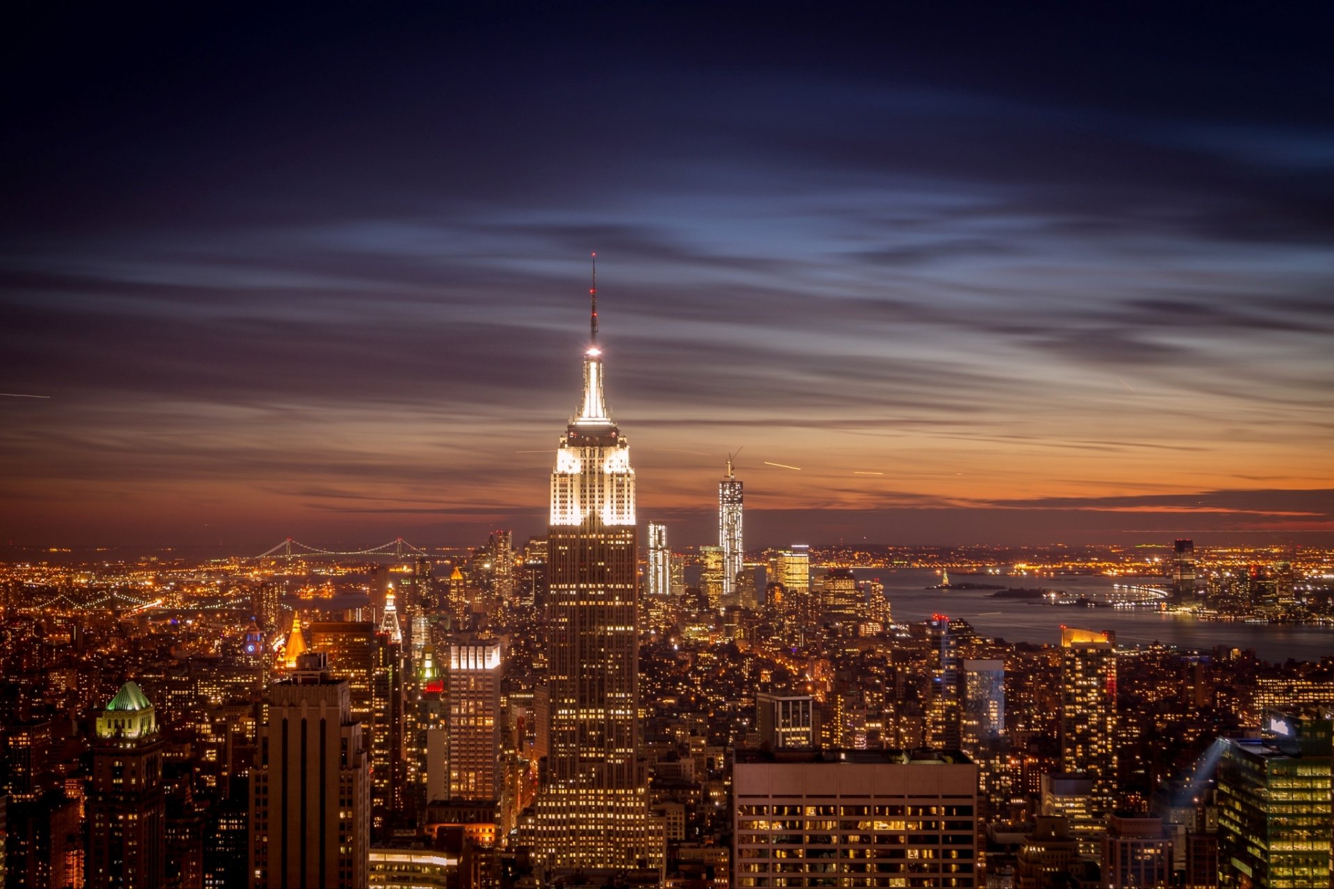 new york usa manhattan empire state building empire state building city panorama evening view skyscrapers buildings houses skyscrapers light