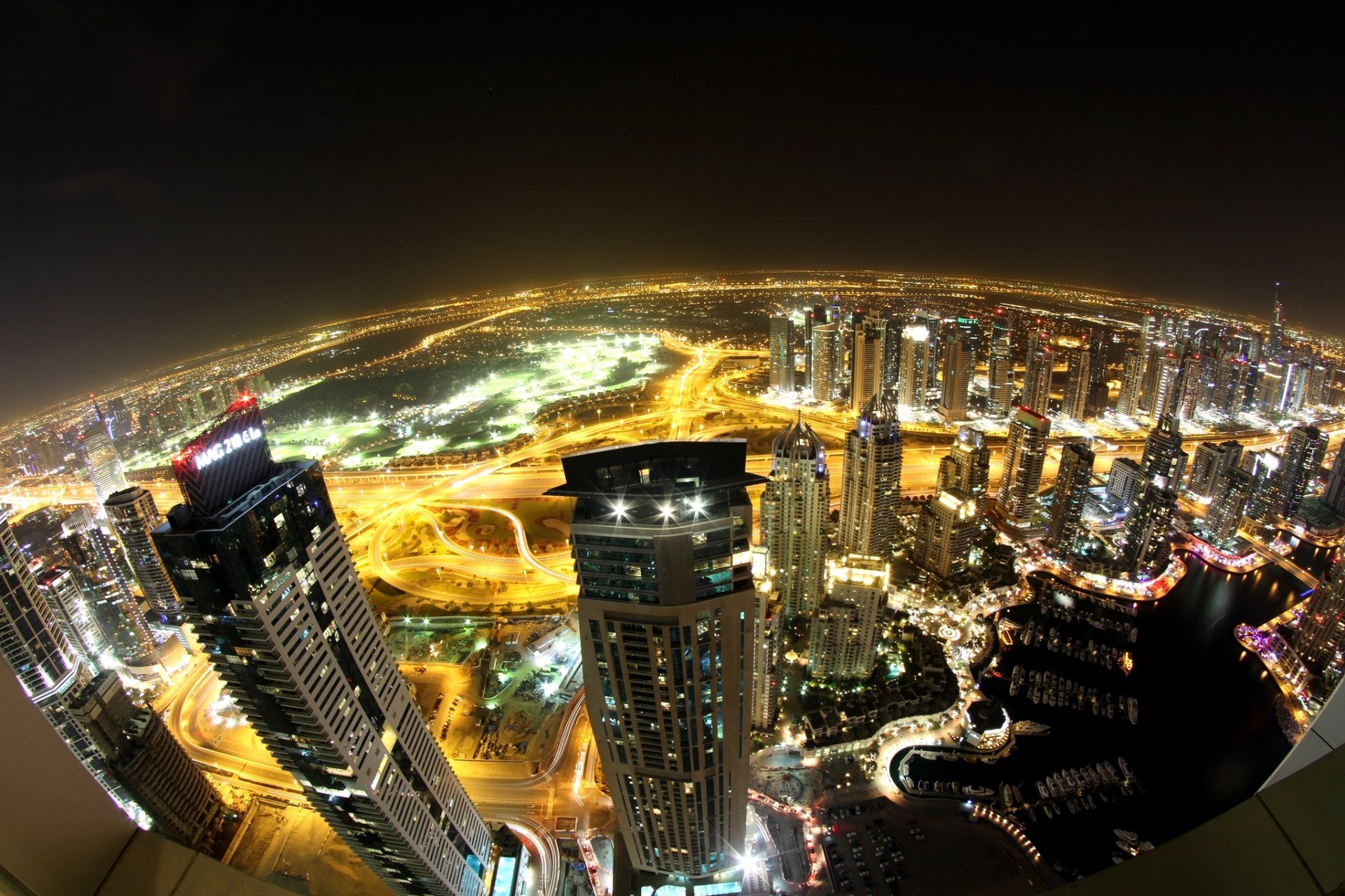 dubai emiratos árabes unidos ciudad vista panorama noche edificios rascacielos casas rascacielos carreteras luces iluminación