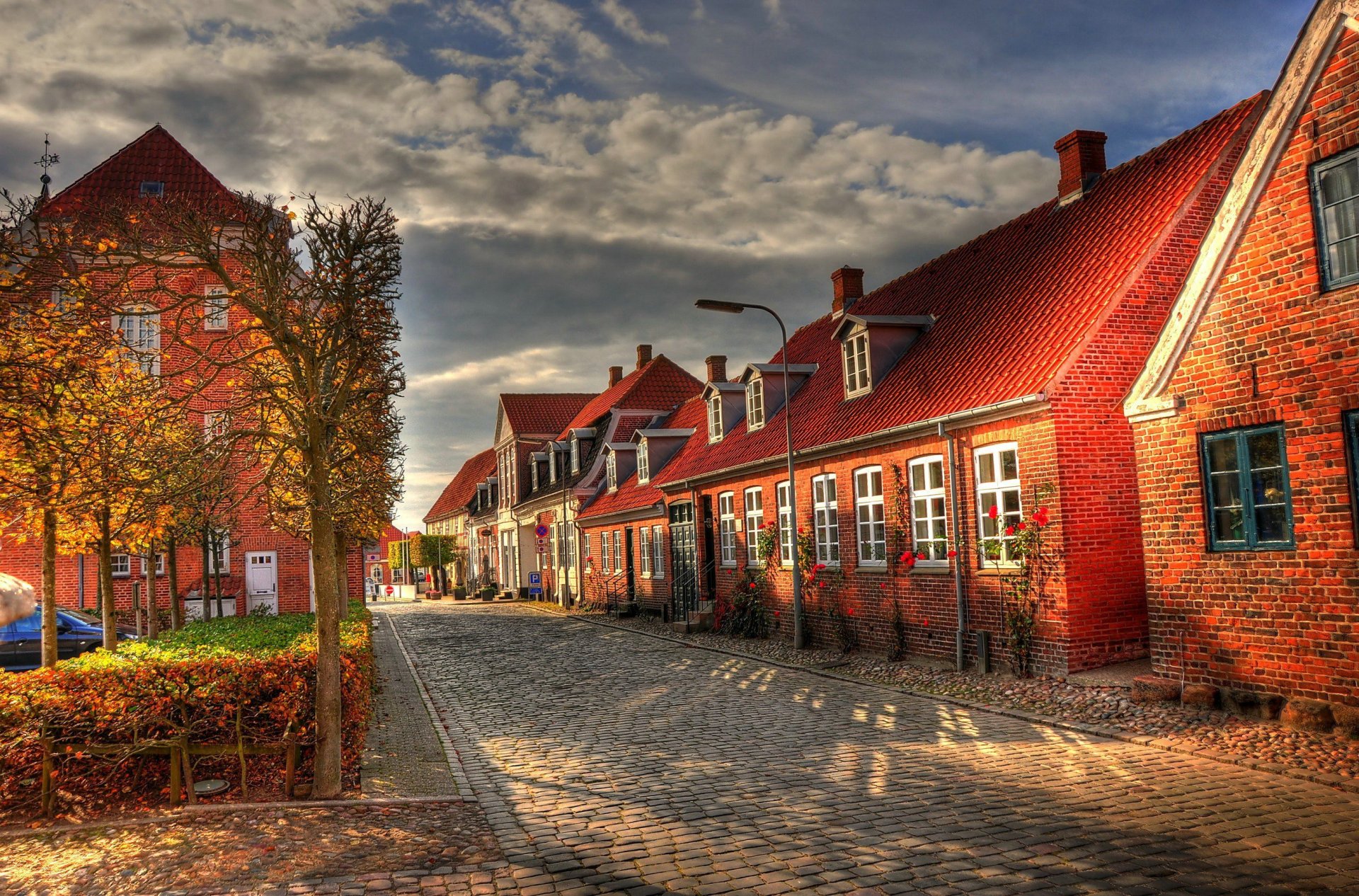 morning houses street street alley houses europe buildings autumn clouds pavement paving stone