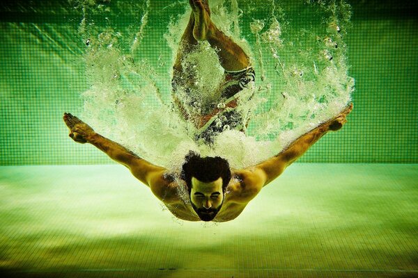 Sporty man in the pool