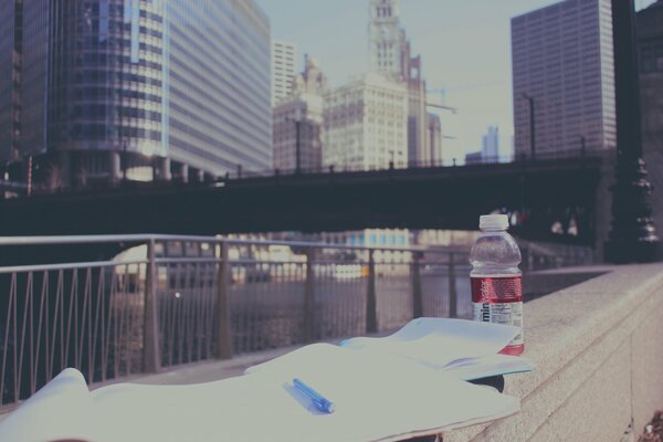 Notebooks on the embankment of the bridge in Chicago
