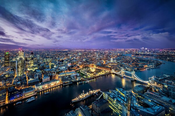 Megapolis, river, bridge top view night