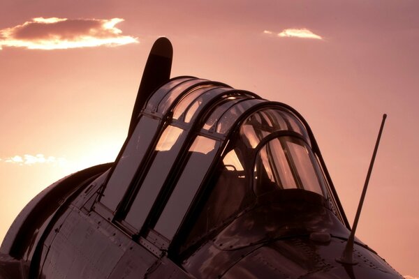 Airplane cabin on the background of sunset