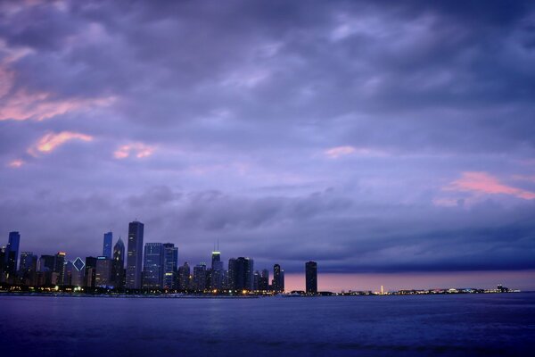 Chicago night lights at sunset