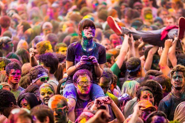 Joyful faces of people at the festival of colors