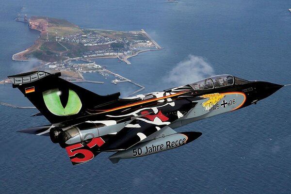 Tornado jet combat aircraft flies over the sea