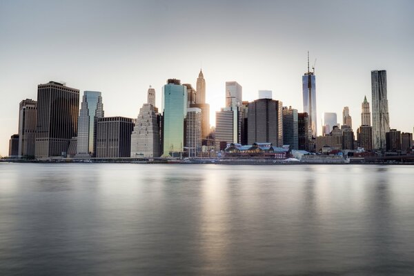 The embankment of the USA city with unusual architecture of buildings