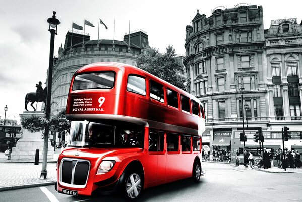 Black and white photo of an English red bus