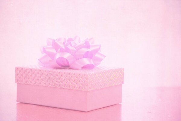 A gift with a pink bow to your girlfriend