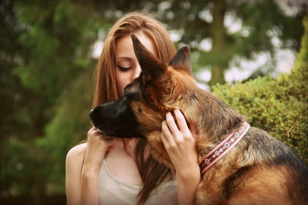A girl with a German shepherd