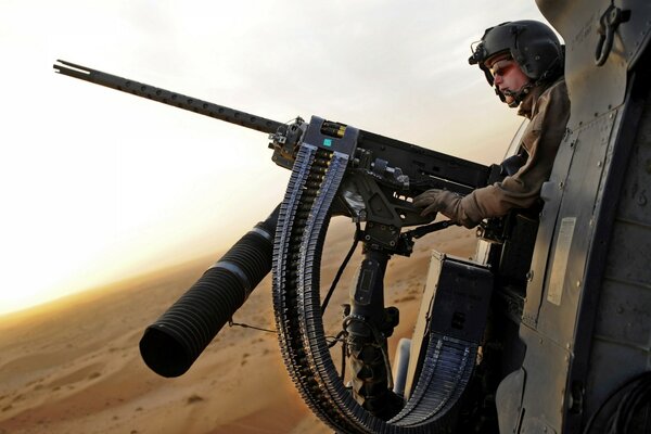 Machine gun in the desert fire at enemies