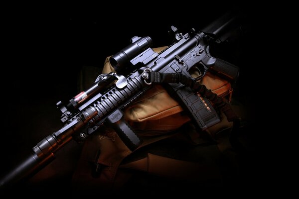 Assault rifle on a dark background