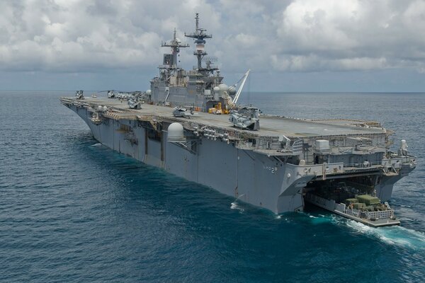 Deck landing ship in the vastness of the ocean