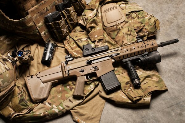 M110 assault rifle and military uniform