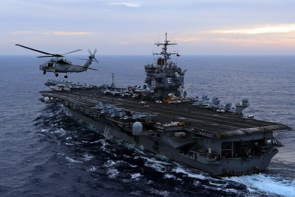 Aircraft carrier with airplanes and turntables on board