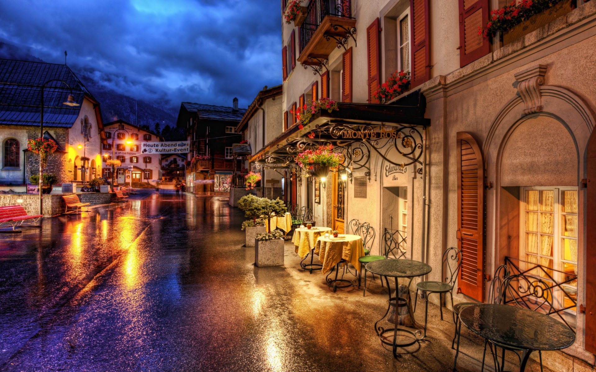 zermatt szwajcaria kawiarnie stoliki ulica droga budynki domy