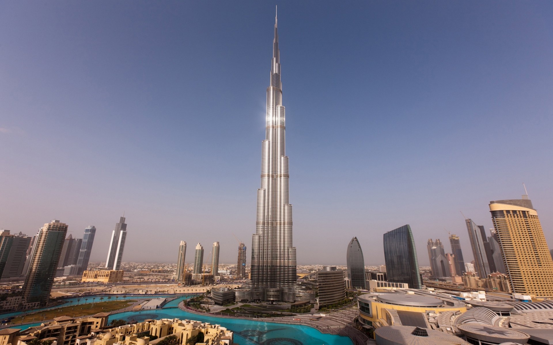 dubai wolkenkratzer türme häuser burj khalifa sonnenuntergang wasser himmel