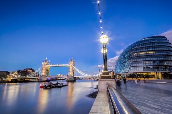 London at night against a dark blue sky