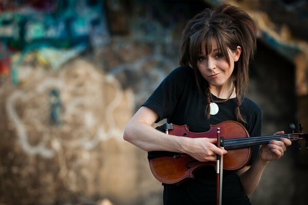 Behind - the - scenes violinist Lindsay stirling