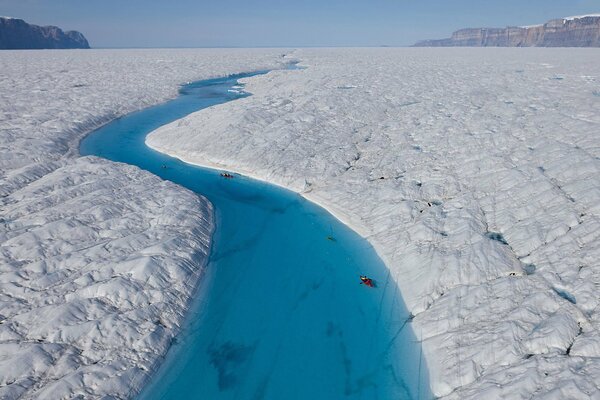 The Blue River between the glaciers of Greenland