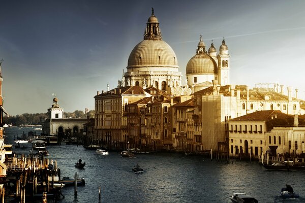 Boats float on the river in Venice