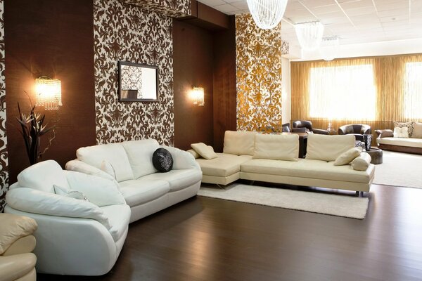 The interior of the living room in brown-beige-white tones