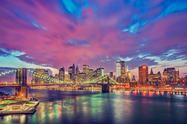 The colorful Brooklyn Bridge. Manhattan