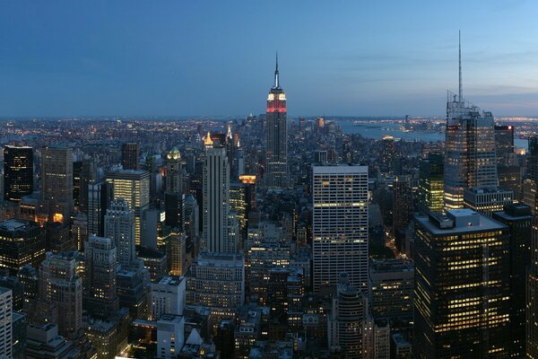 Evening panorama of the city against the blue sky