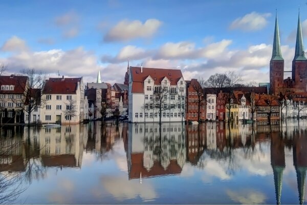 Reflection in the water of European houses