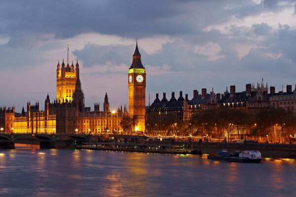 Evening city with a tall clock big ben