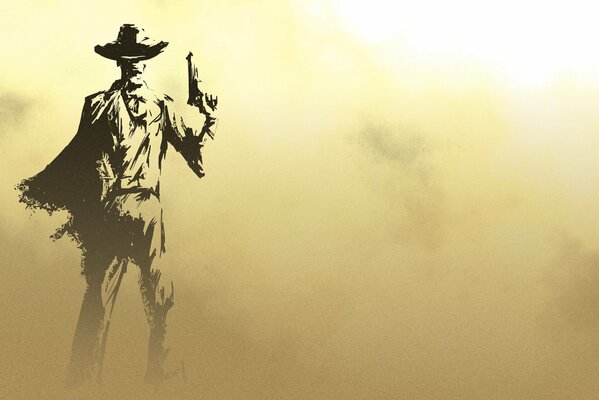 Cowboy with a gun on a desert background