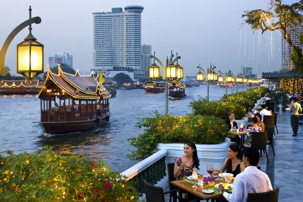 Restaurant tables along the river bank