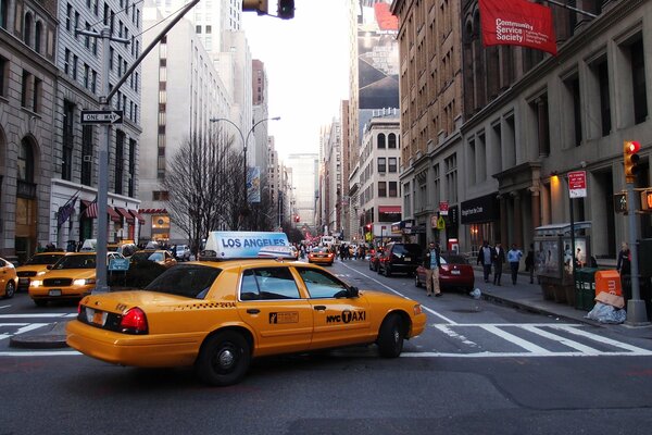 Taxi zebra skyscrapers big city street