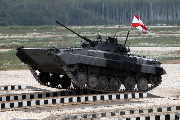 The tank passes the obstacle track bridge at the landfill