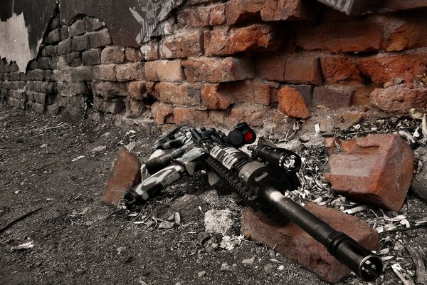 Machine gun on the background of ruins