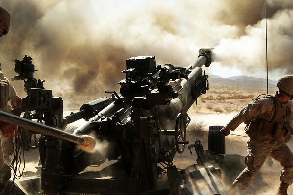 Infantry firing from howitzers in the dust