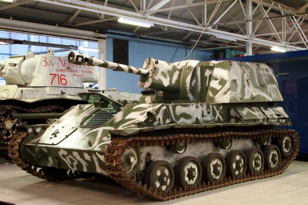 White and green tank in the hangar