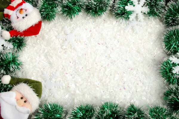 Cadre de Noël de clinquant avec le père Noël et bonhomme de neige