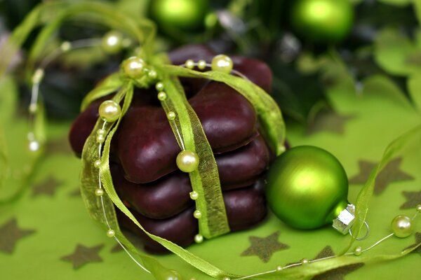 A stack of Christmas sweets tied with a ribbon