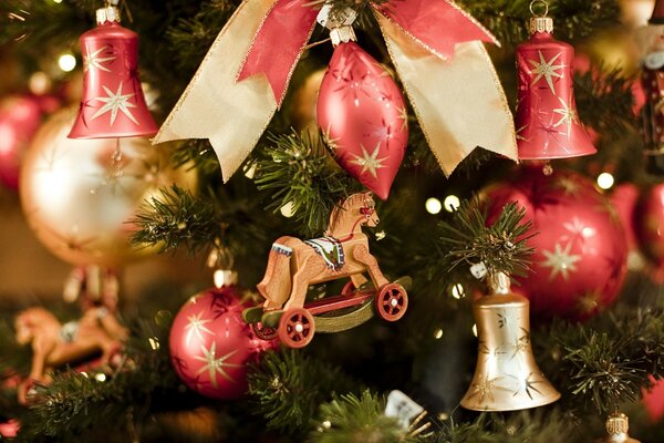 Vintage wooden toys on a Christmas tree