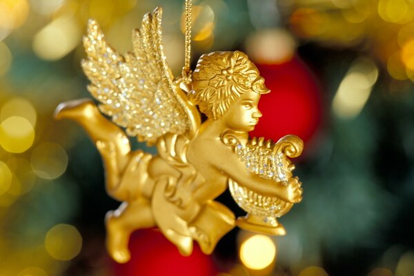 New Year s figurine of an angel in gilding