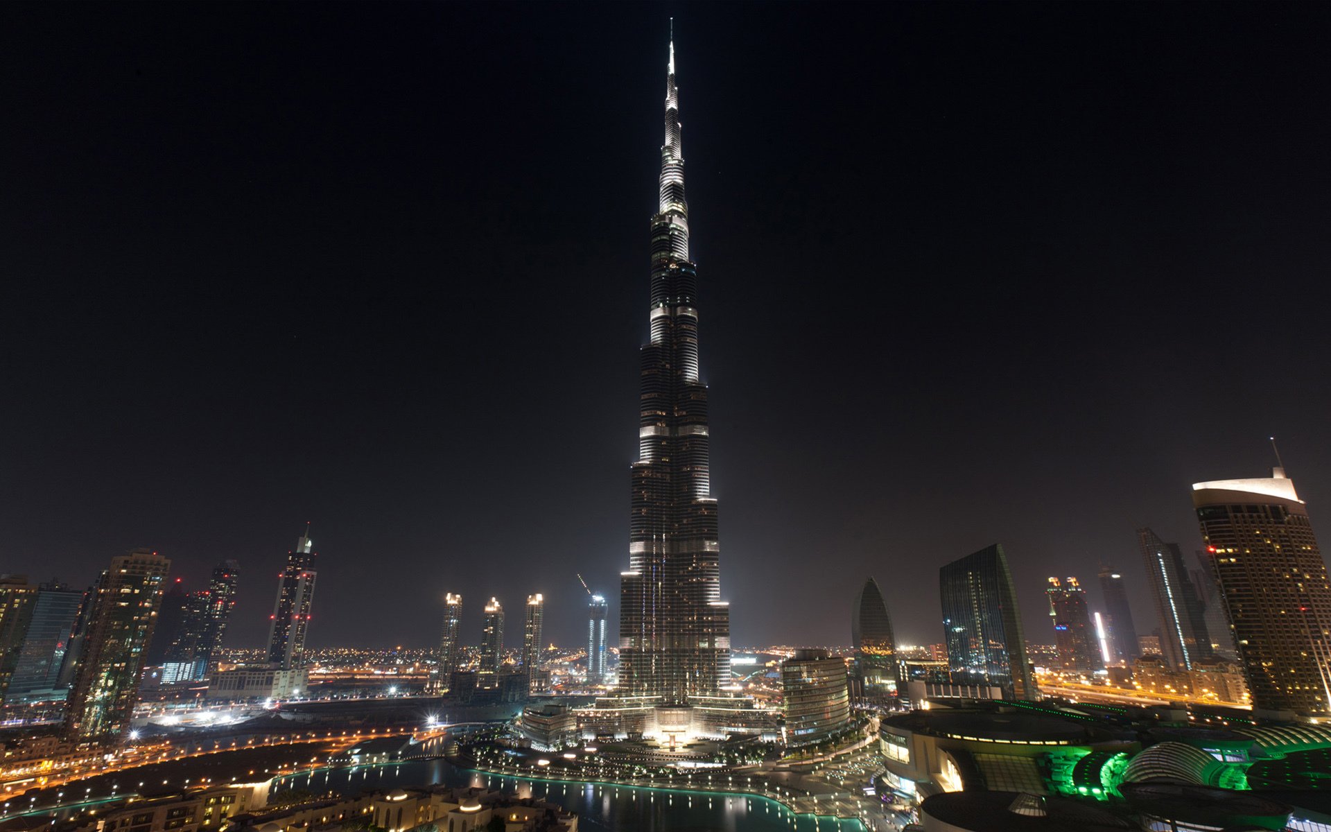 dubai wolkenkratzer türme häuser burj khalifa vereinigte arabische emirate wasser schwimmbad himmel nacht