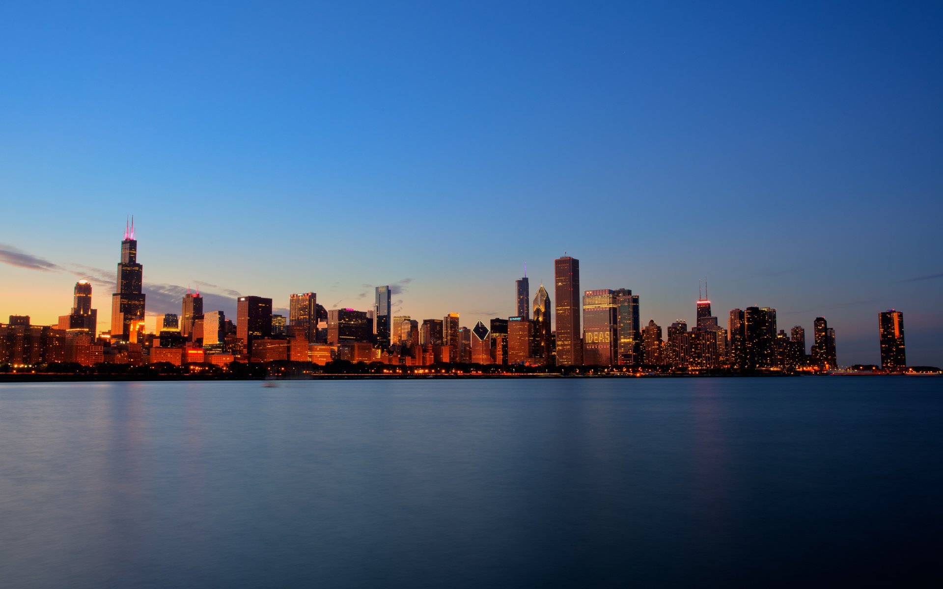 chicago città tramonto edifici case lago acqua cielo luce 2560x1600