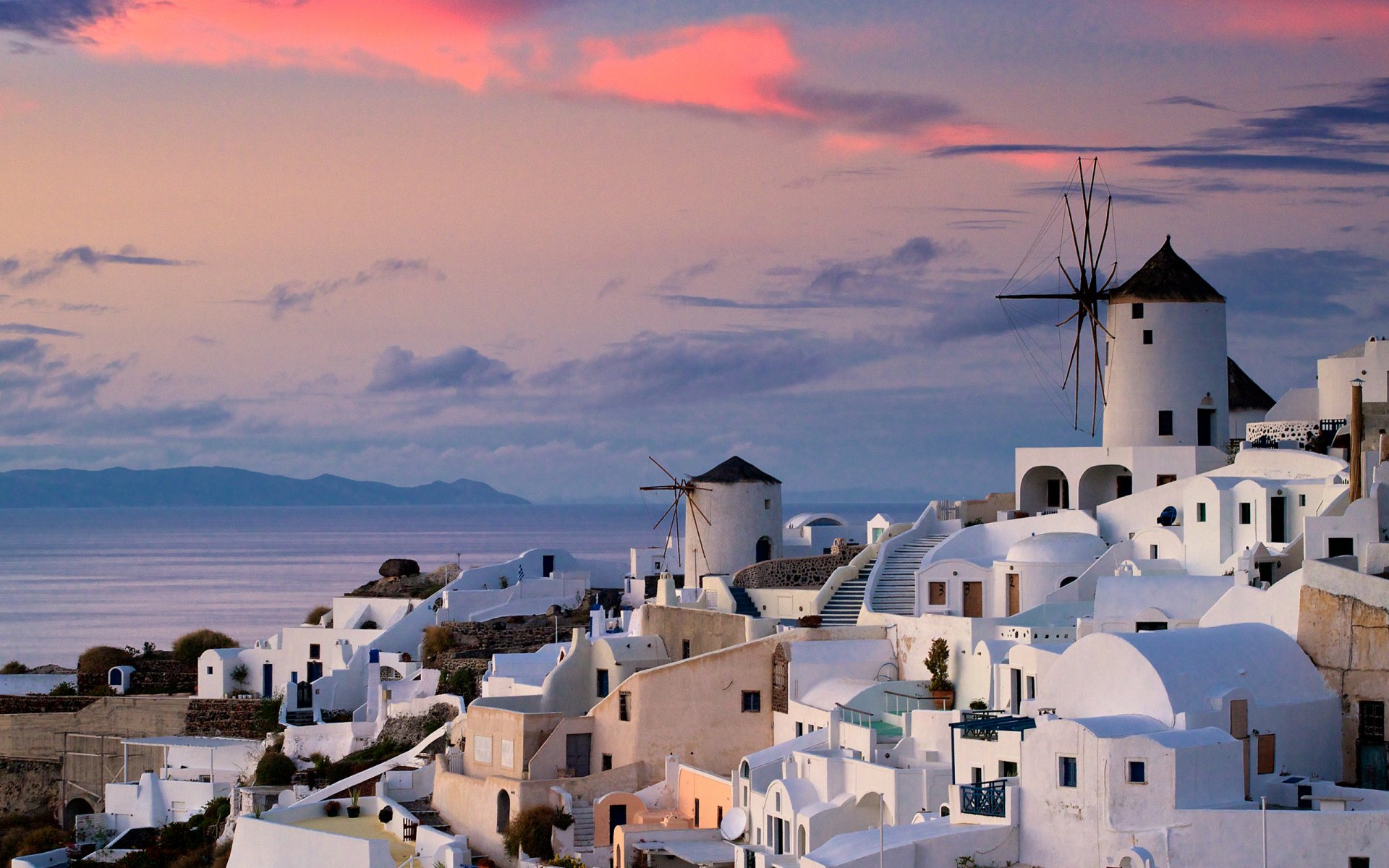 oia grecia ciudad casas puesta de sol océano agua cielo nubes 2560x1600