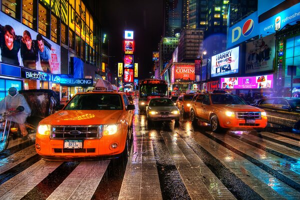 A New York street with cars at night