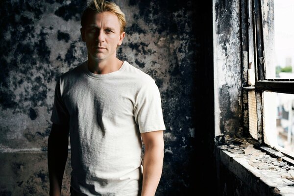 Actor Daniel Craig in an abandoned building