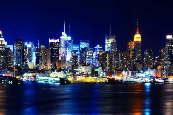 Manhattan lights against the night sky
