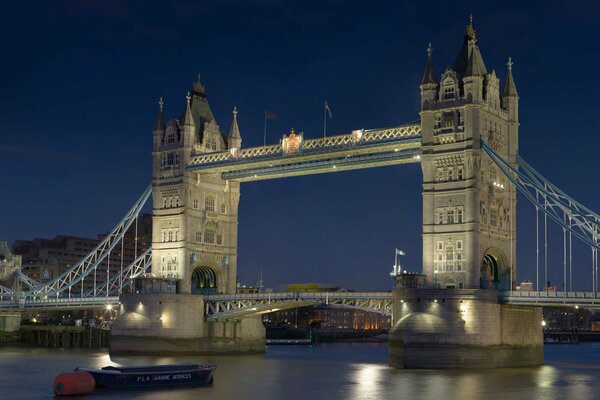 The ancient Tower Bridge over the dormant Thames