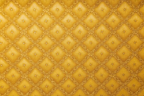 Texture of yellow upholstery with floral pattern