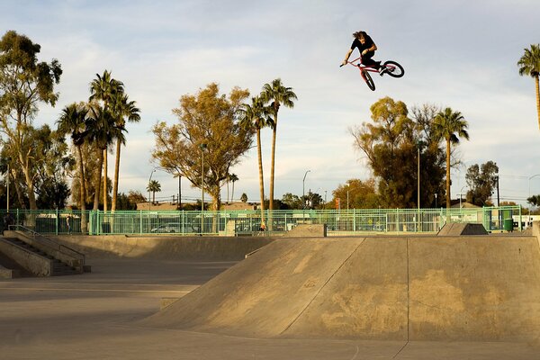 A guy on a bike in flight